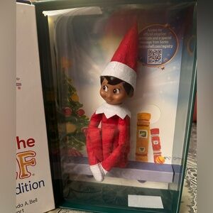 The Elf on the Shelf: A Christmas Tradition - Red and White